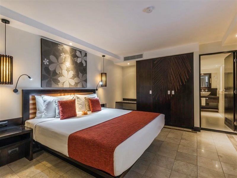 منتجع ذا وارويك فيجي كوروليفو المظهر الخارجي الصورة A bedroom at the Taj Bengal